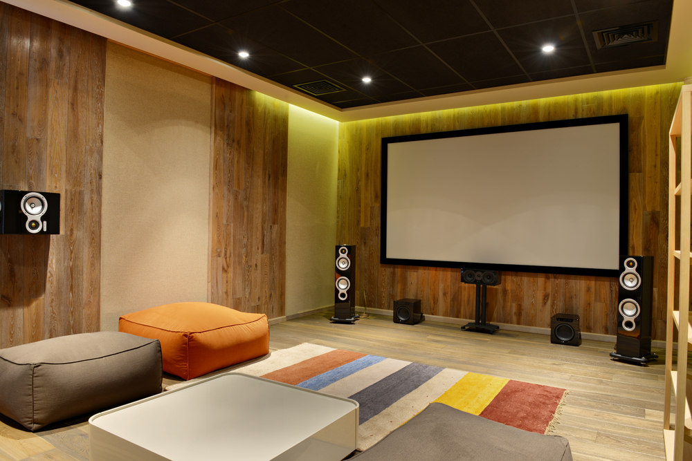 What is the ideal seating position and type in a home theater