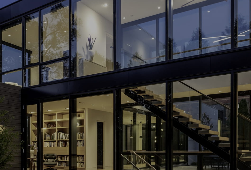 modern education building interior with glass walls and open staircase
