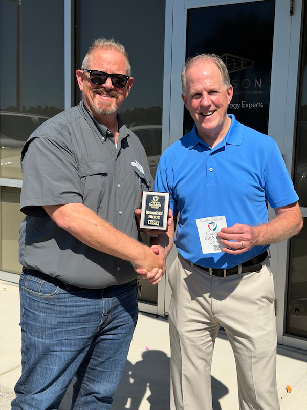 Steve Weber receives Liaison Technology Group’s membership plaque from the Greater Fort Myers Chamber of Commerce